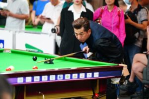 Andy Lam plays a shot at last year's event in Shanghai
