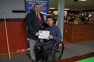Stuart Barker presents Andrew Blood with a certificate at the Hull Open