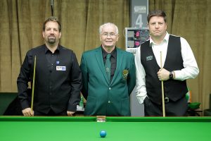 Peter Hull and Daniel Kelly pose by the table