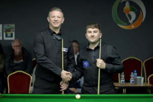 Lewis Knowles and Luke Drennan shake hands