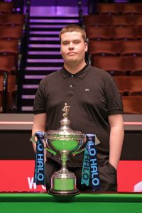 Archie Buskin with the World Championship trophy