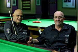 Mahomed Abubaker and Dave Beaumont shake hands before their final match