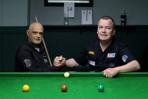 Mahomed Abubaker and Tony Southern shake hands