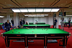 Andrew Blood plays a snooker shot