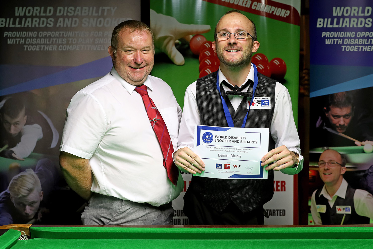 Stuart Barker and Daniel Blunn smiling with certificate