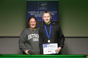 Dainton Barrass celebrates with family after his victory