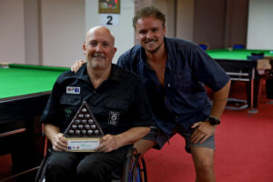 Dave Beaumont poses with his son