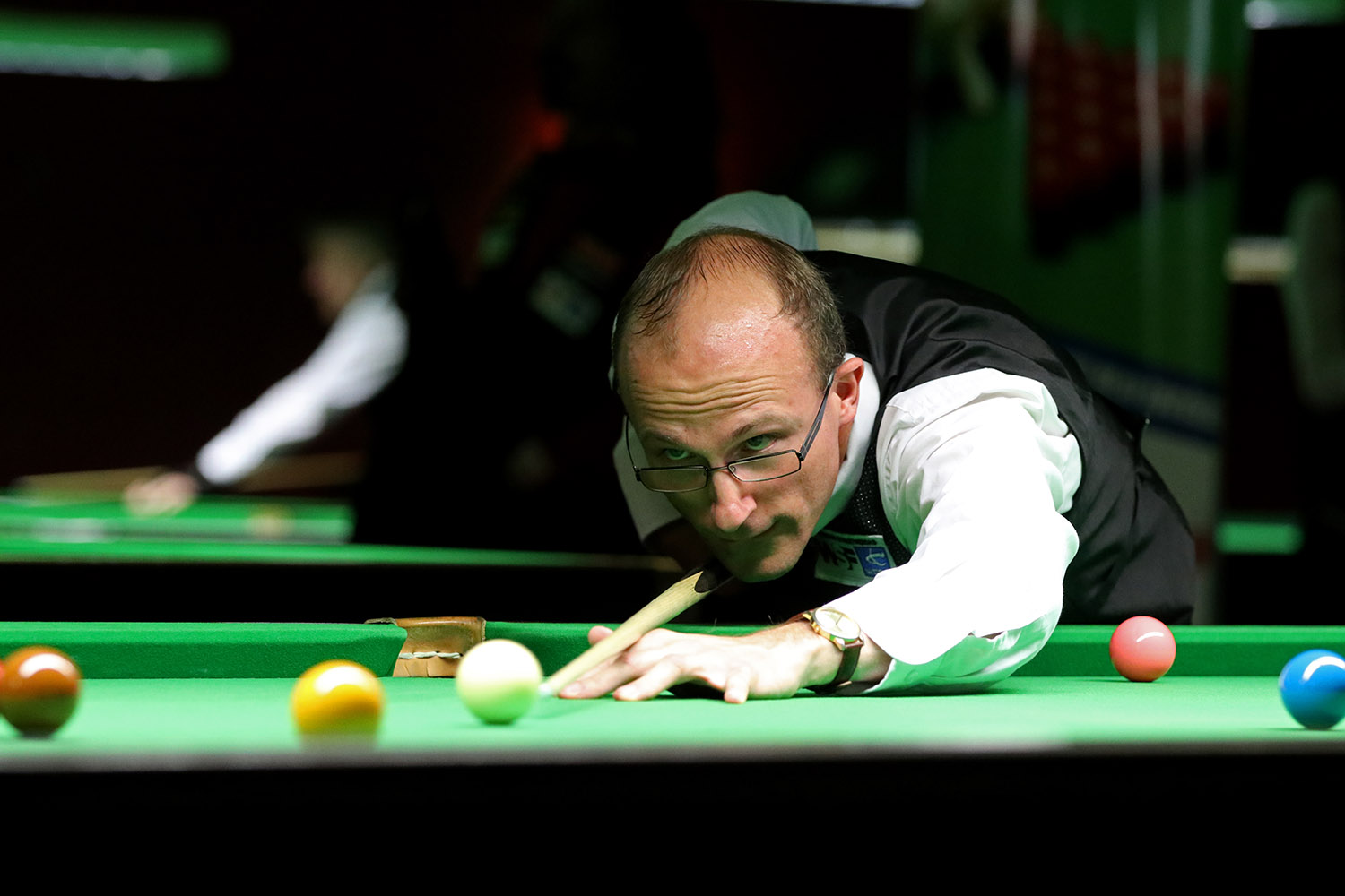 Man playing snooker shot