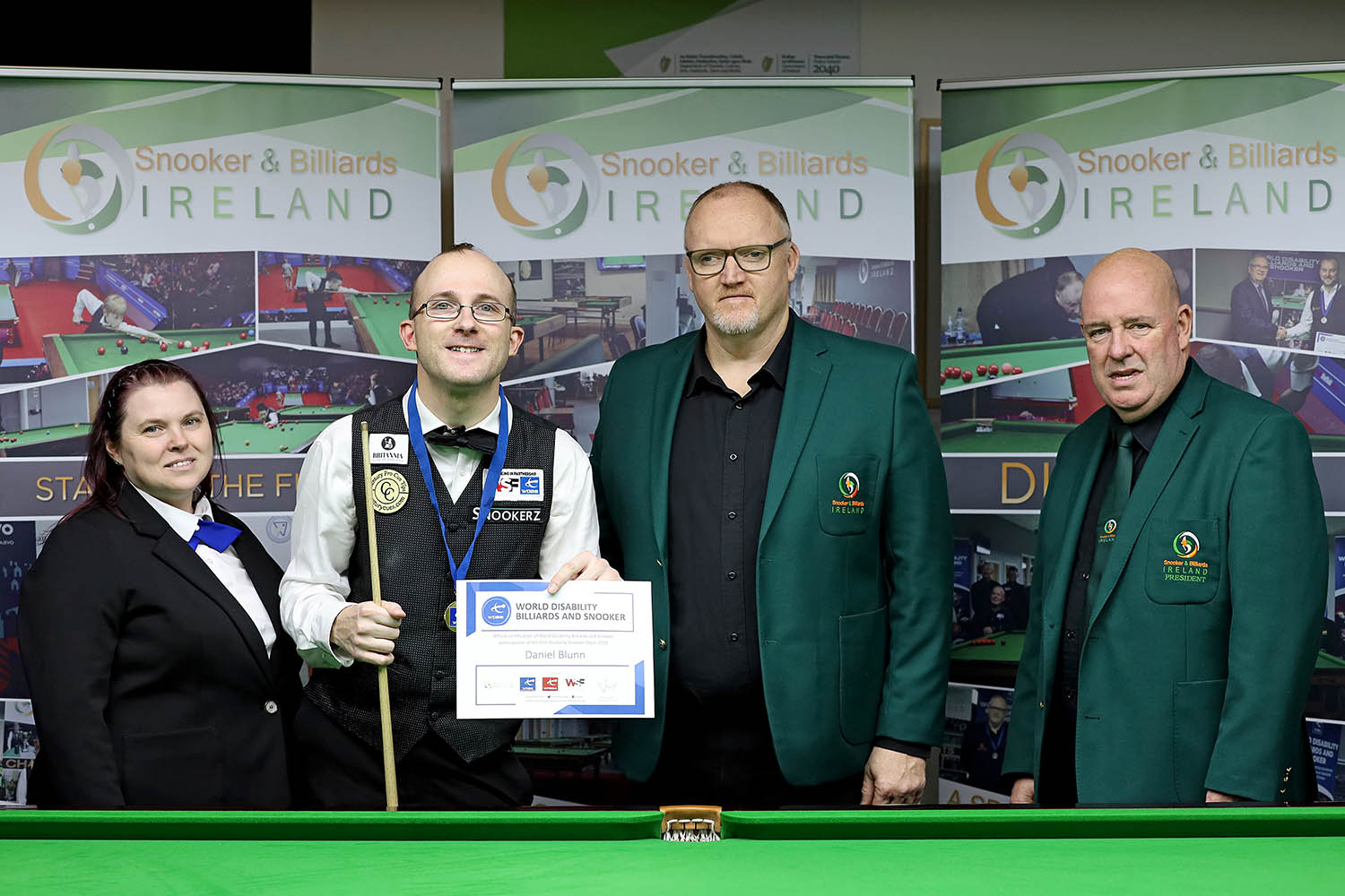 Daniel Blunn poses with the SBI team after his victory
