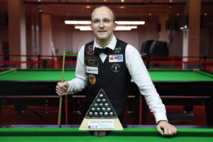 Daniel Blunn poses with the trophy