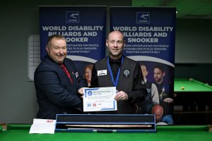 Dave Bolton receives his medal