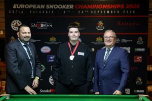 Archie Buskin receives his silver medal at the European Championship