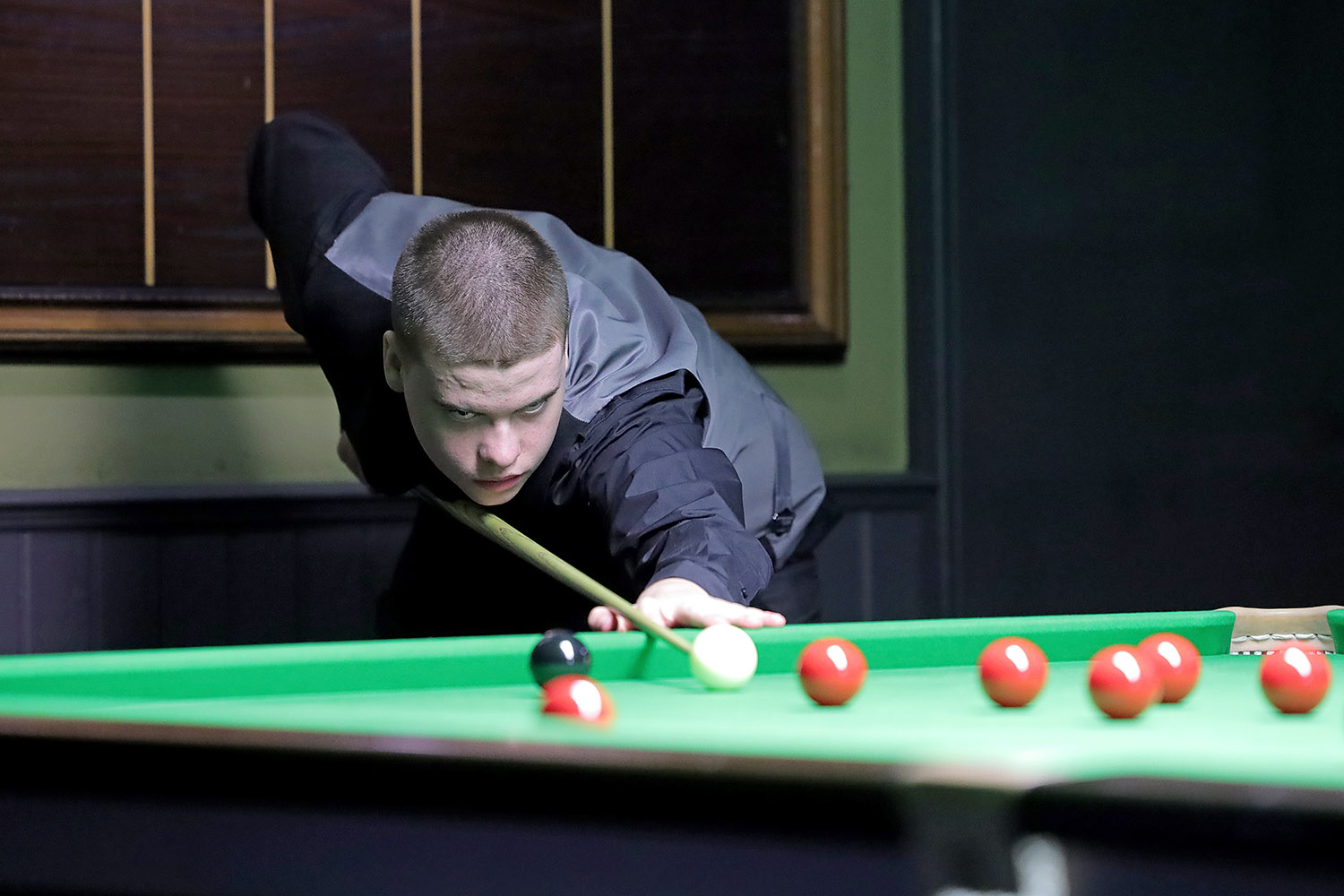 Archie Buskin playing snooker shot