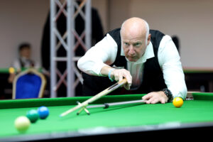 Steve Cartwright plays a snooker shot
