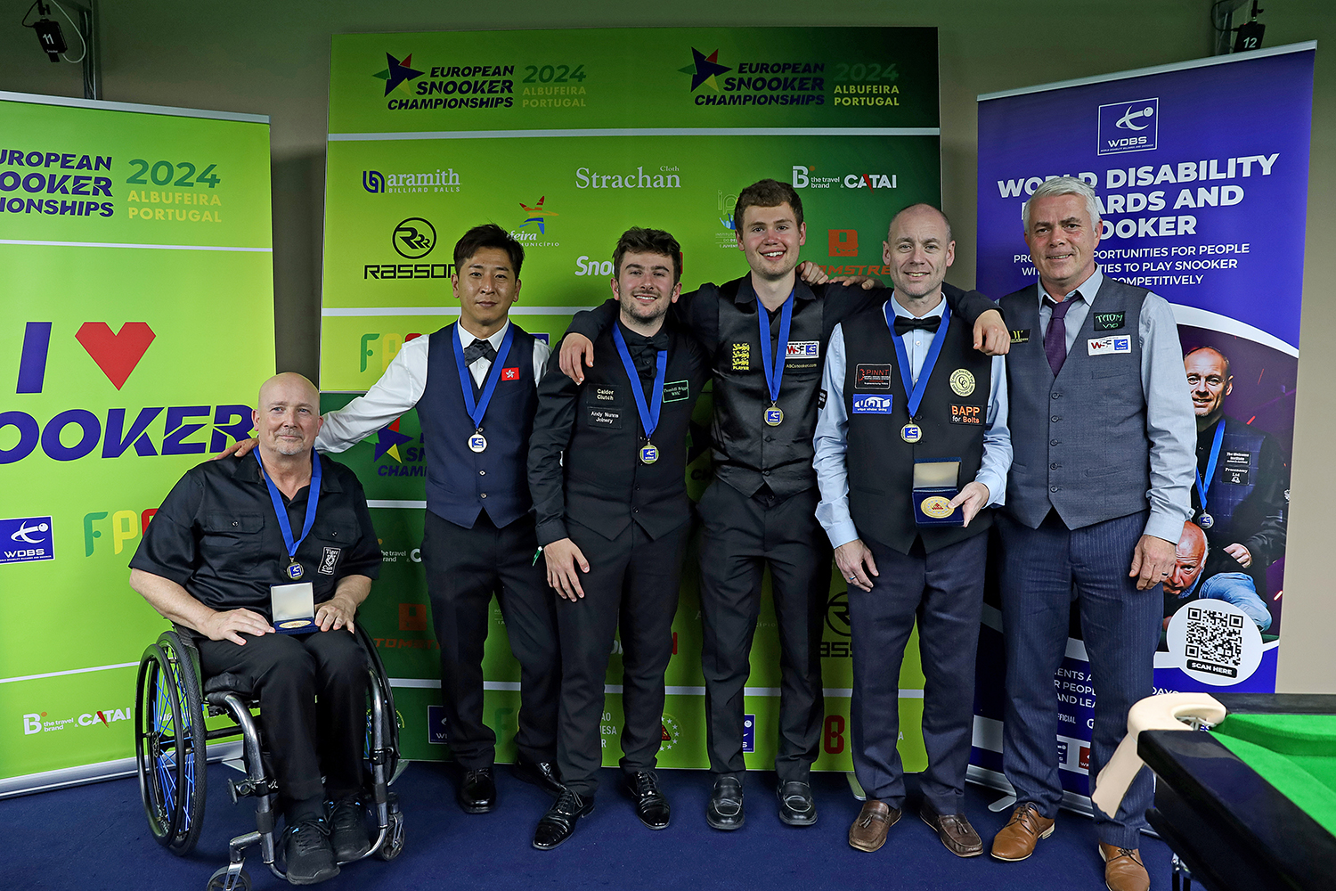 Six players with medals smiling