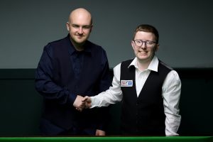 Dominic Crookes and Aidan Pollitt shake hands