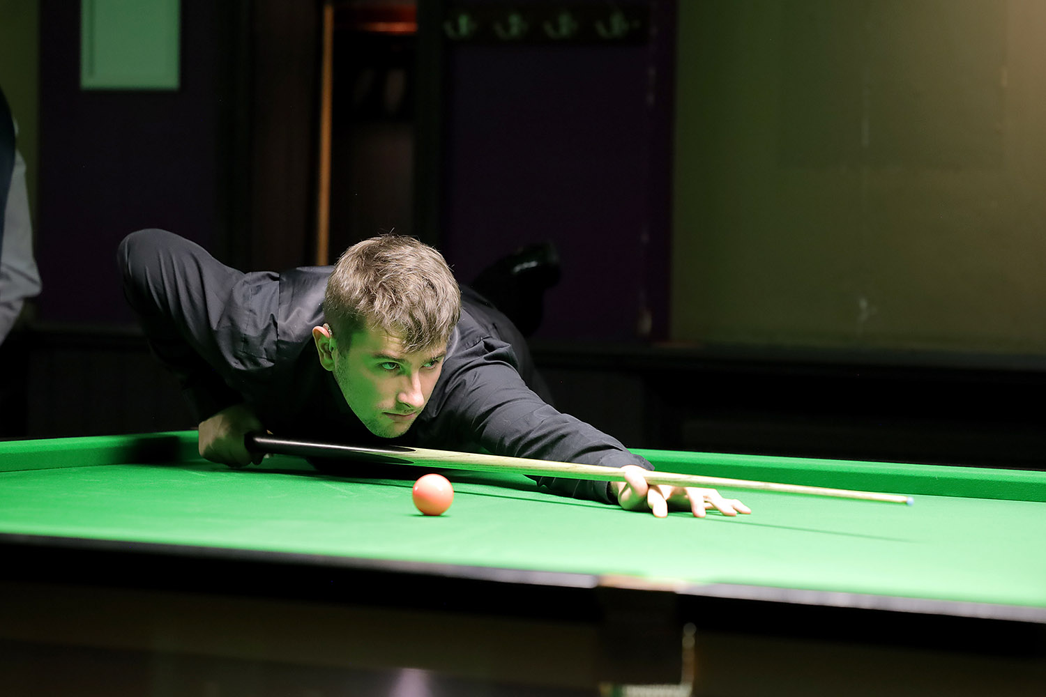 Luke Drennan plays snooker shot