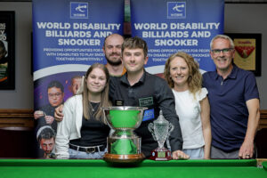 Luke Drennan with the Nick Oliver Trophy after winning the 2025 Champion of Champions