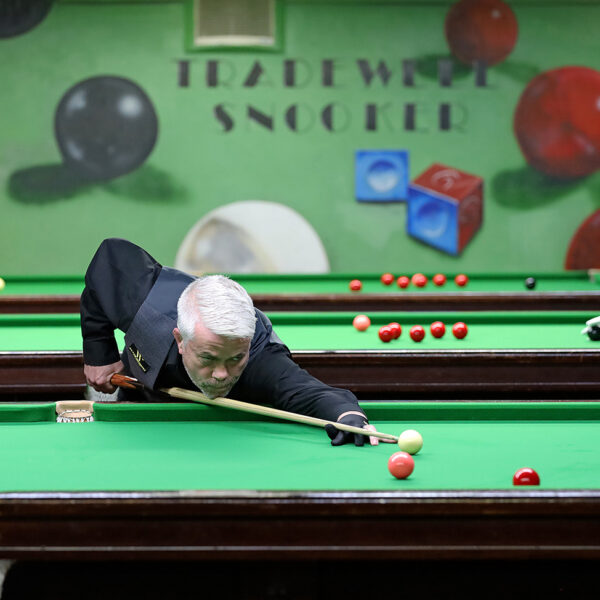 Carl Gibson plays a snooker shot