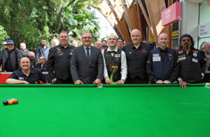 A group photo in the Winter Garden during World Disability Snooker Day 2025