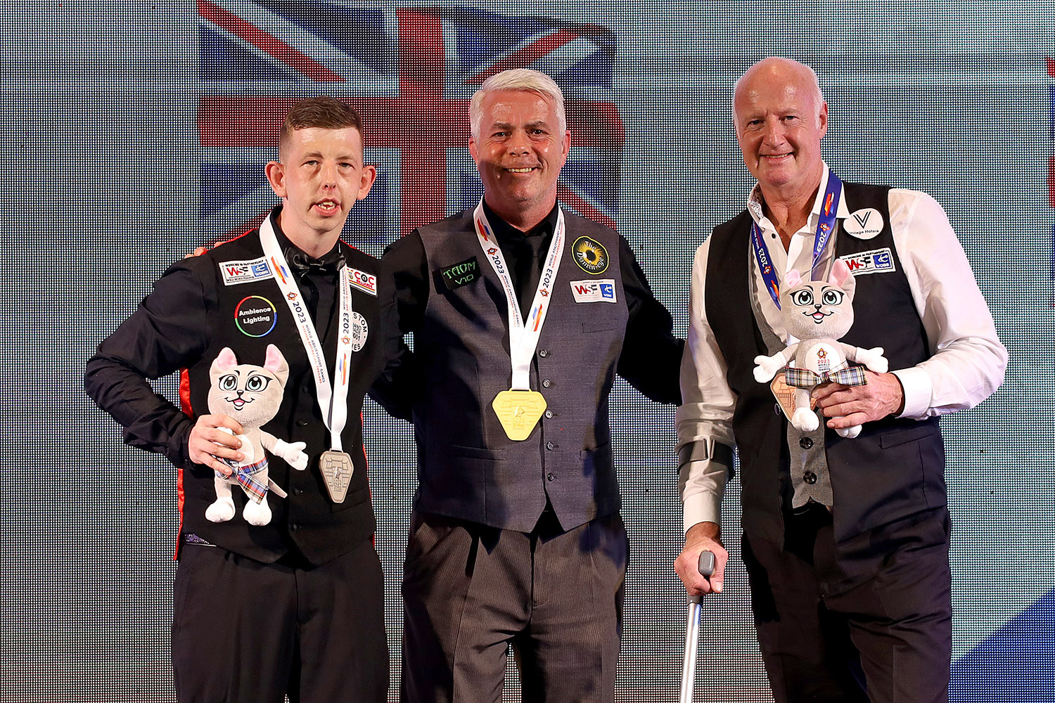 Group 4 medallists on podium