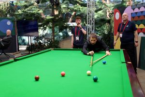 Peter Hull plays a snooker shot