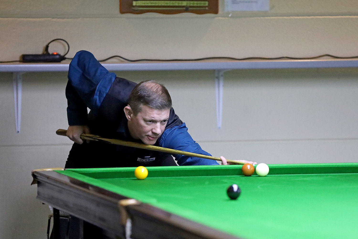 Lewis Knowles plays snooker shot