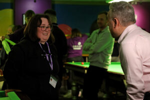 BBC Look North presenter Tom Ingle interviews are participant of sensory snooker at the Northern Snooker Centre