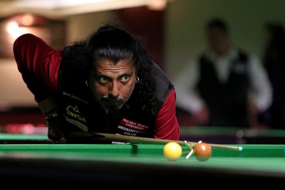 Kal Mattu plays snooker shot