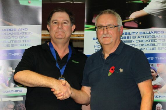 Paul Smith shakes hand of Allan Morley of Think Telecom