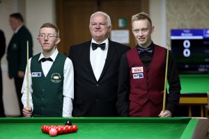 Niall Pollitt and Nicklas Olsen smile before their group stage match
