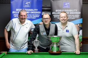 Alan Reynolds poses with the trophy after victory last year