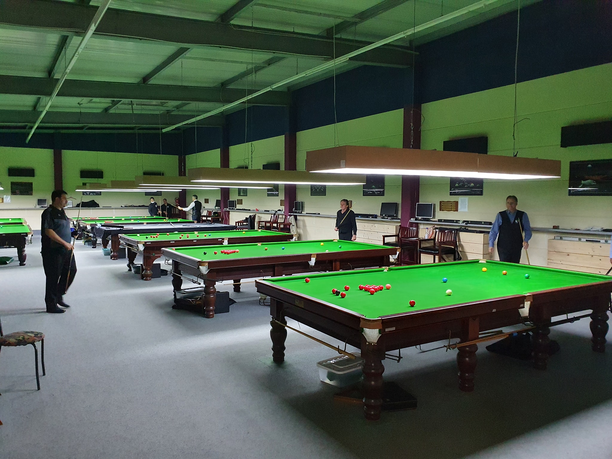 People playing snooker
