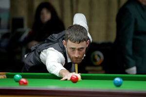 Ryan Ryding plays a snooker shot