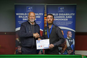 Ryan Ryding receives his winners certificate in Hull