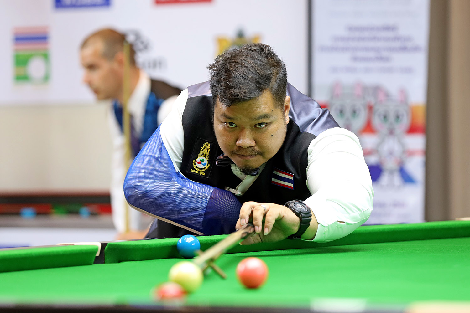 Thanapol Seekao plays snooker shot with rest