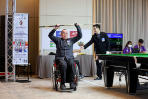 Tony Southern celebrates after victory at the World Abilitysport Games