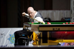 Gary Swift plays a snooker shot