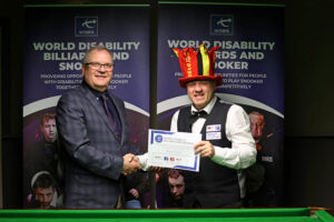 WDBS Chairman Nigel Mawer QPM shakes hands with Nigel Braiser at the 2025 Belgian Open